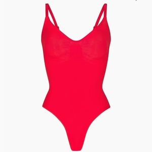 Skims red body suit